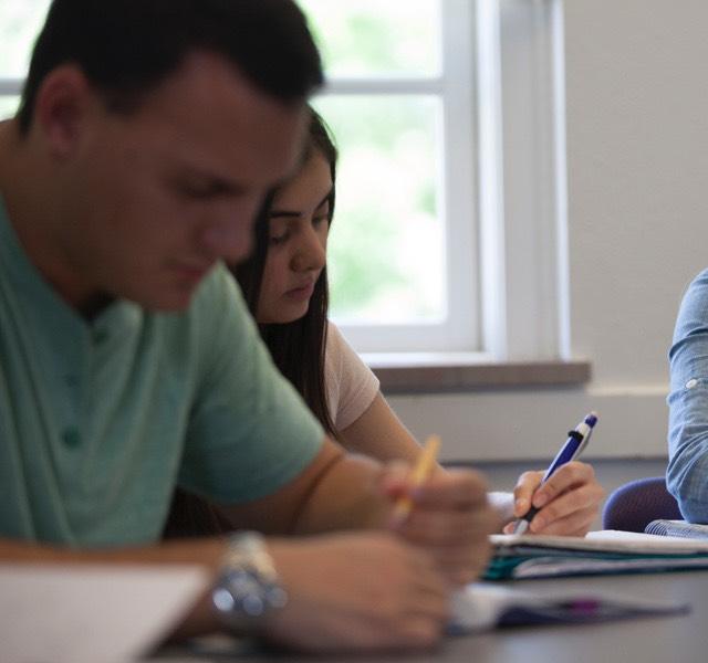 Students working on a creative writing assignment